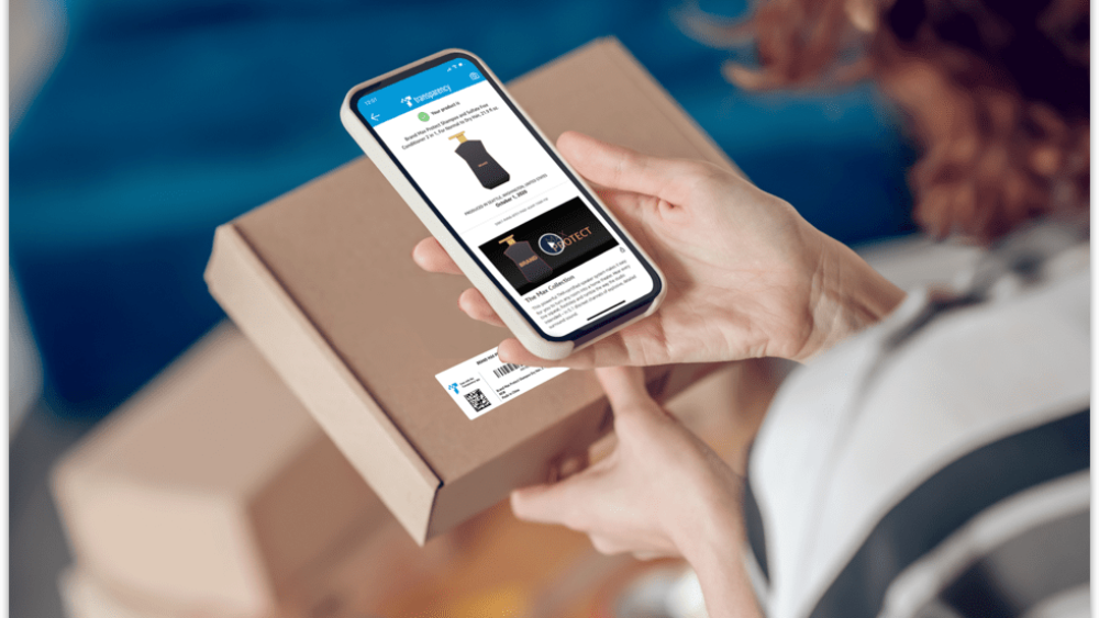 A person scanning a box with their phone app