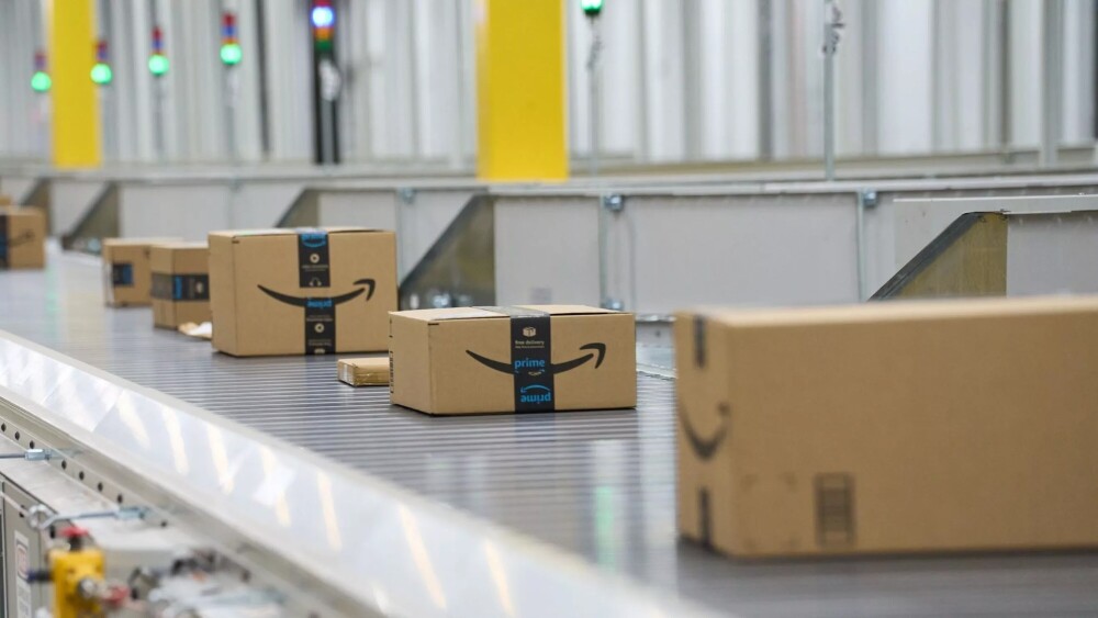 Amazon packages on conveyor belt in an Amazon fulfillment center